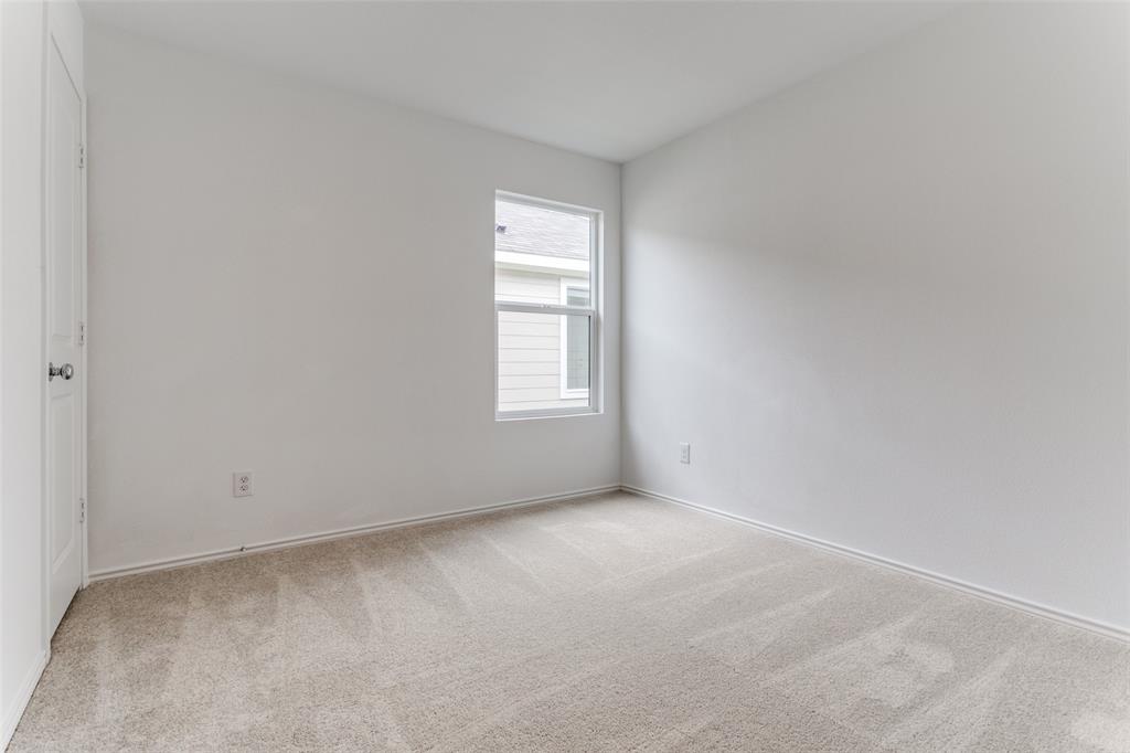 127 Sunflower Street Princeton, TX 75407 - Photo 6 of 21 Unfurnished room featuring light carpet