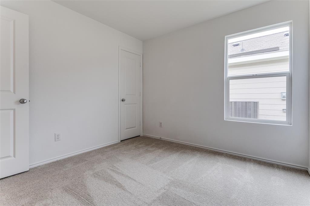 127 Sunflower Street Princeton, TX 75407 - Photo 7 of 21 View of carpeted empty room