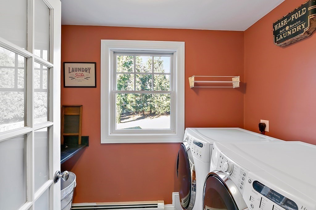 37 Gould Road Newton, MA 02468 - Photo 11 of 29 a utility room with dryer and washer
