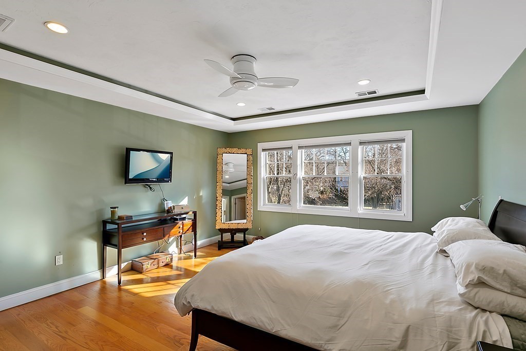 37 Gould Road Newton, MA 02468 - Photo 18 of 29 a bedroom with a bed and large windows