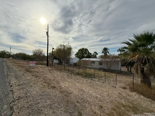 a view of a garden with a fountain