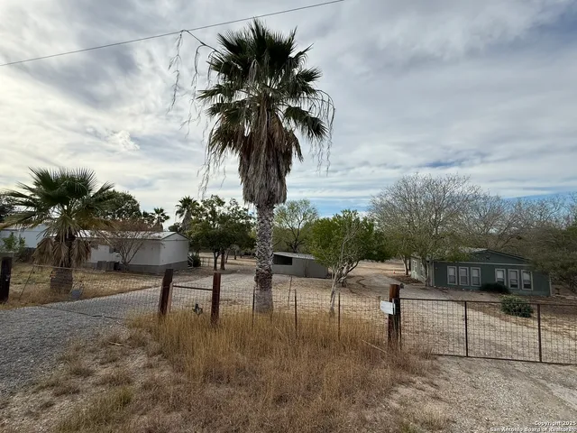 a view of a yard and entertaining space