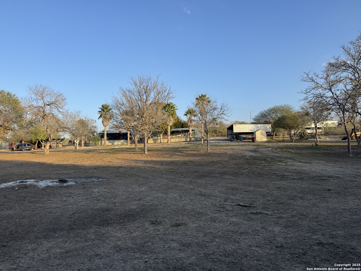 123 Choke Canyon Estates Drive Three Rivers, TX 78071 - Photo 10 of 19 a view of street with houses