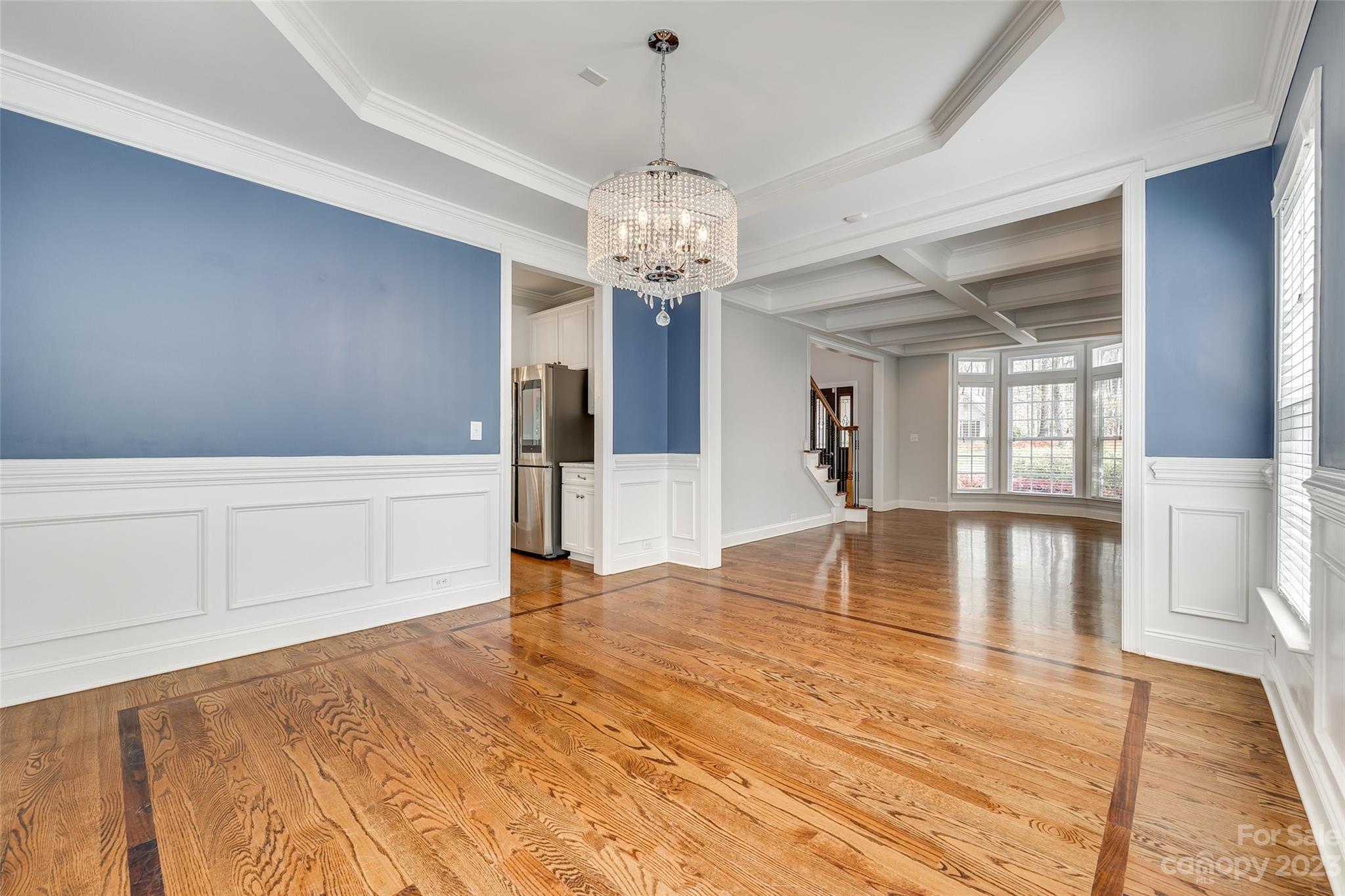 16420 Woolwine Road Charlotte, NC 28278 - Photo 12 of 41 a view of an empty room with window and wooden floor