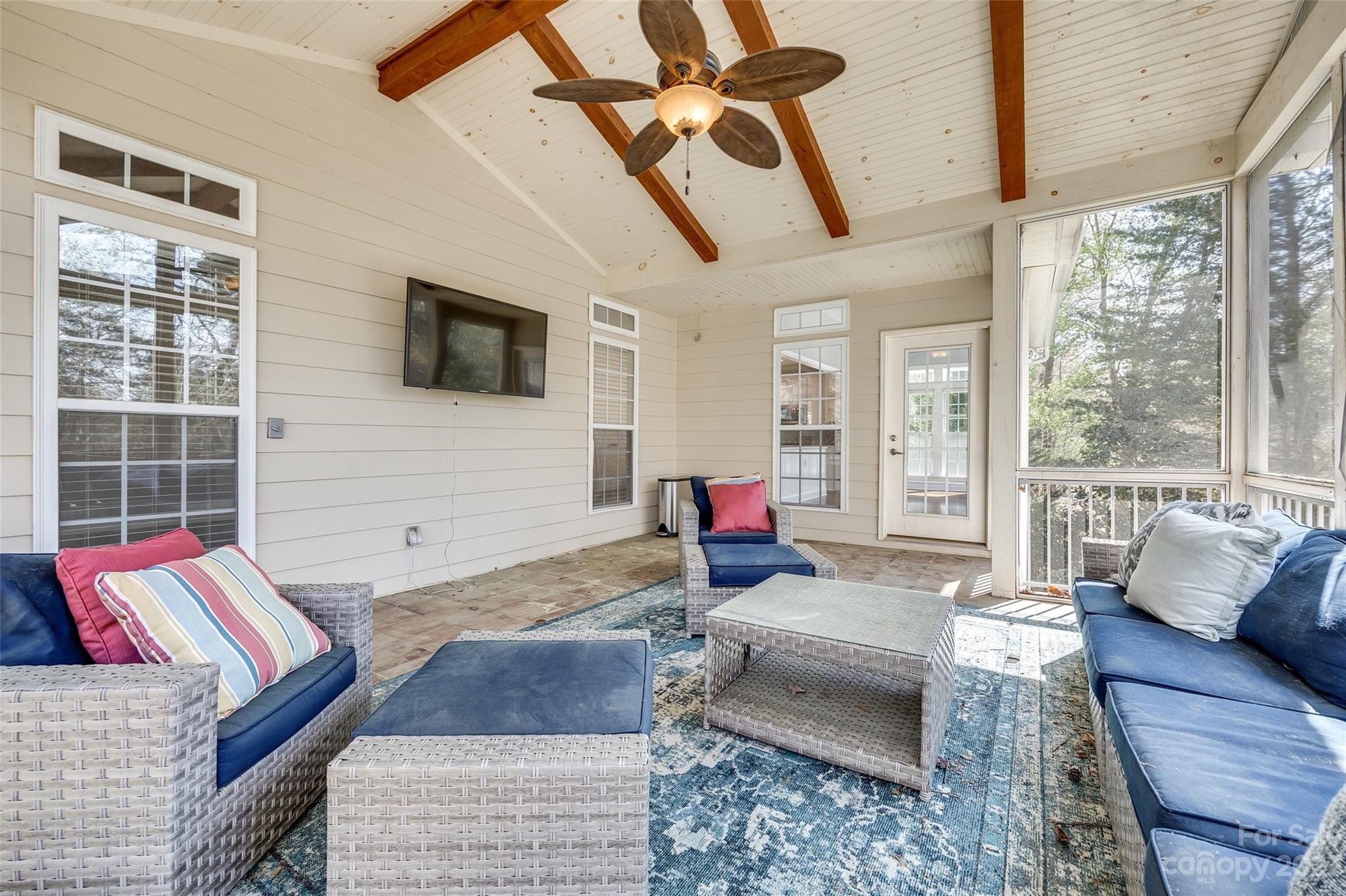 16420 Woolwine Road Charlotte, NC 28278 - Photo 13 of 41 a living room with furniture and a flat screen tv