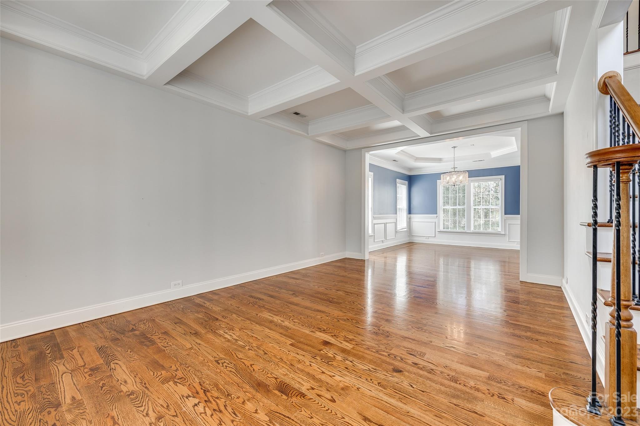 16420 Woolwine Road Charlotte, NC 28278 - Photo 16 of 41 an empty room with wooden floor and windows