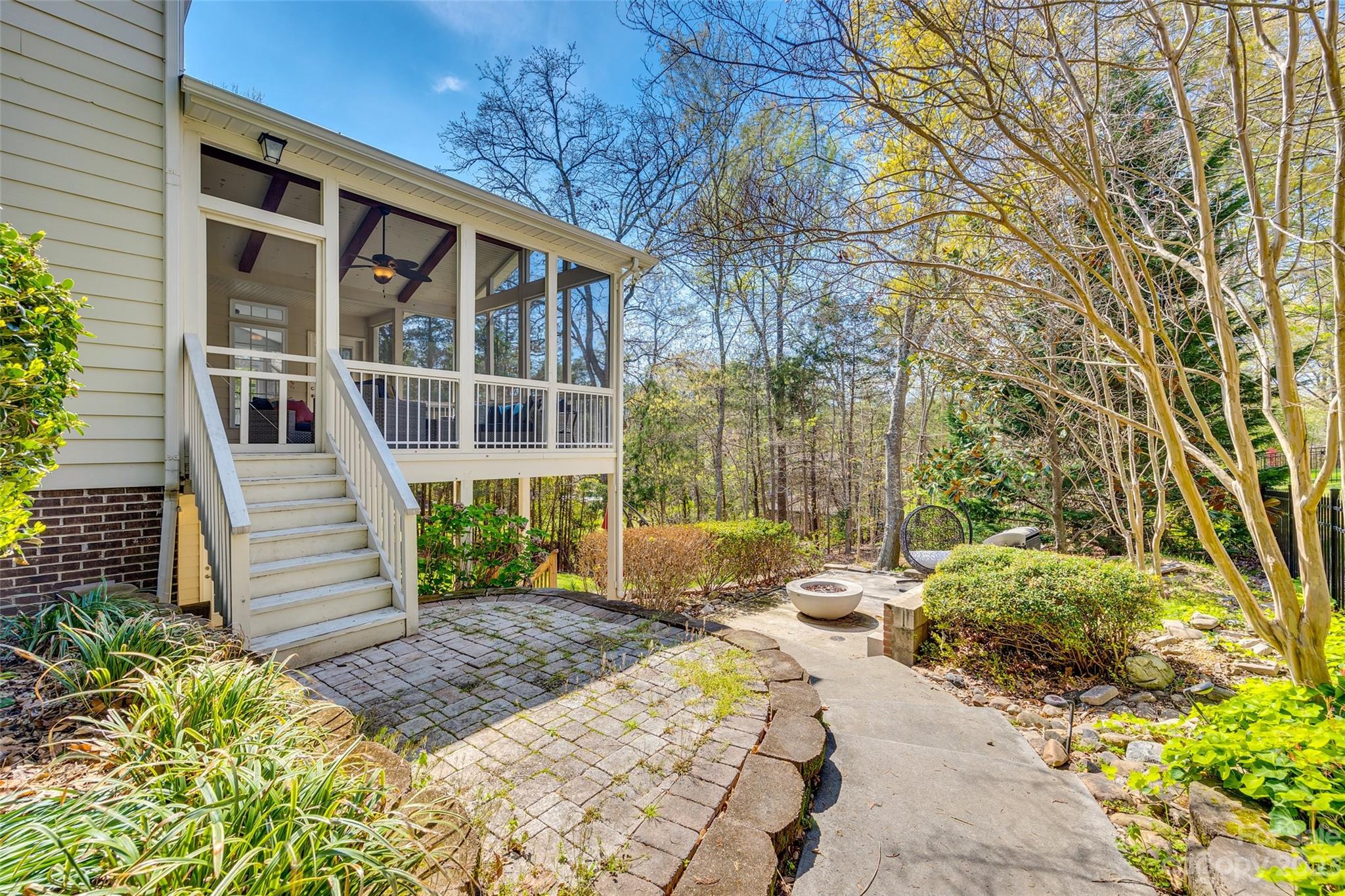 16420 Woolwine Road Charlotte, NC 28278 - Photo 18 of 41 a view of a house with a yard