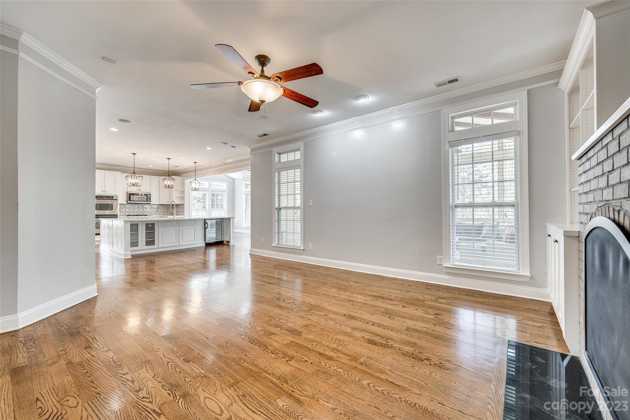 16420 Woolwine Road Charlotte, NC 28278 - Photo 29 of 41 a view of an empty room with window and wooden floor