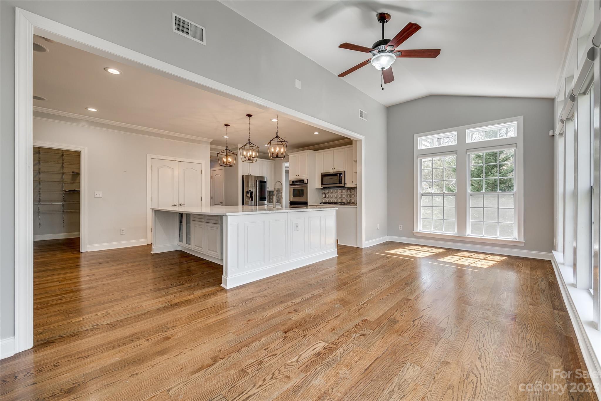 16420 Woolwine Road Charlotte, NC 28278 - Photo 30 of 41 a view of kitchen with cabinets and wooden floor