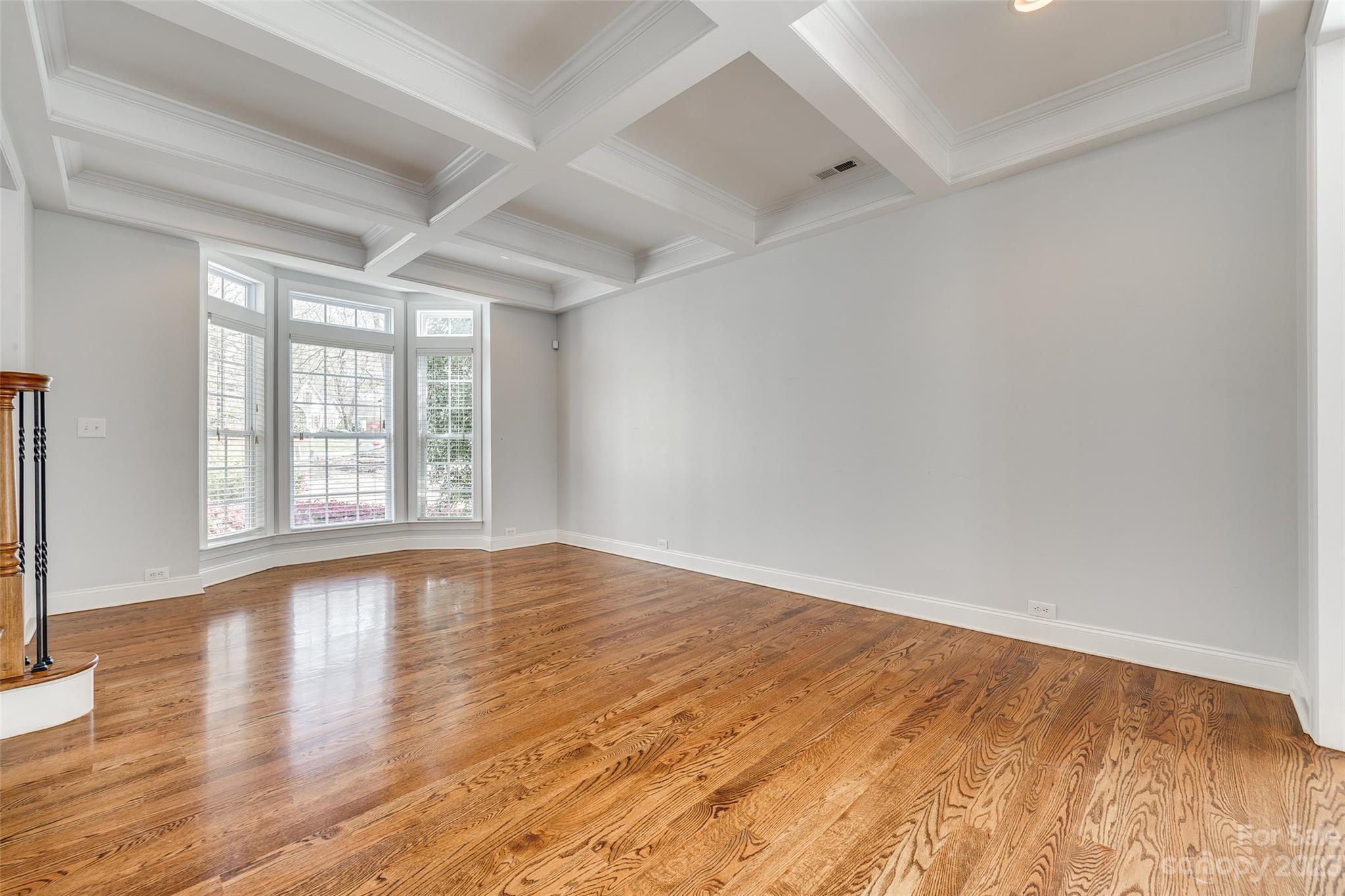16420 Woolwine Road Charlotte, NC 28278 - Photo 32 of 41 wooden floor in an empty room with a window