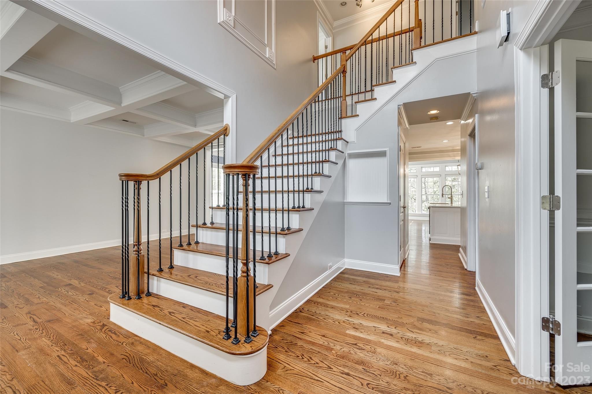 16420 Woolwine Road Charlotte, NC 28278 - Photo 5 of 41 a view of entryway with wooden floor and stairs