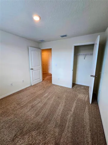 a bathroom with a glass door shower