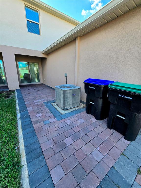 17101 Water Spring Boulevard Winter Garden, FL 34787 - Photo 28 of 29 a house view with a backyard space