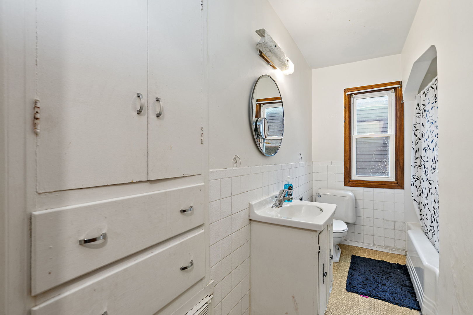 820 Lincoln Highway Rochelle, IL 61068 - Photo 21 of 27 a bathroom with a sink and a mirror