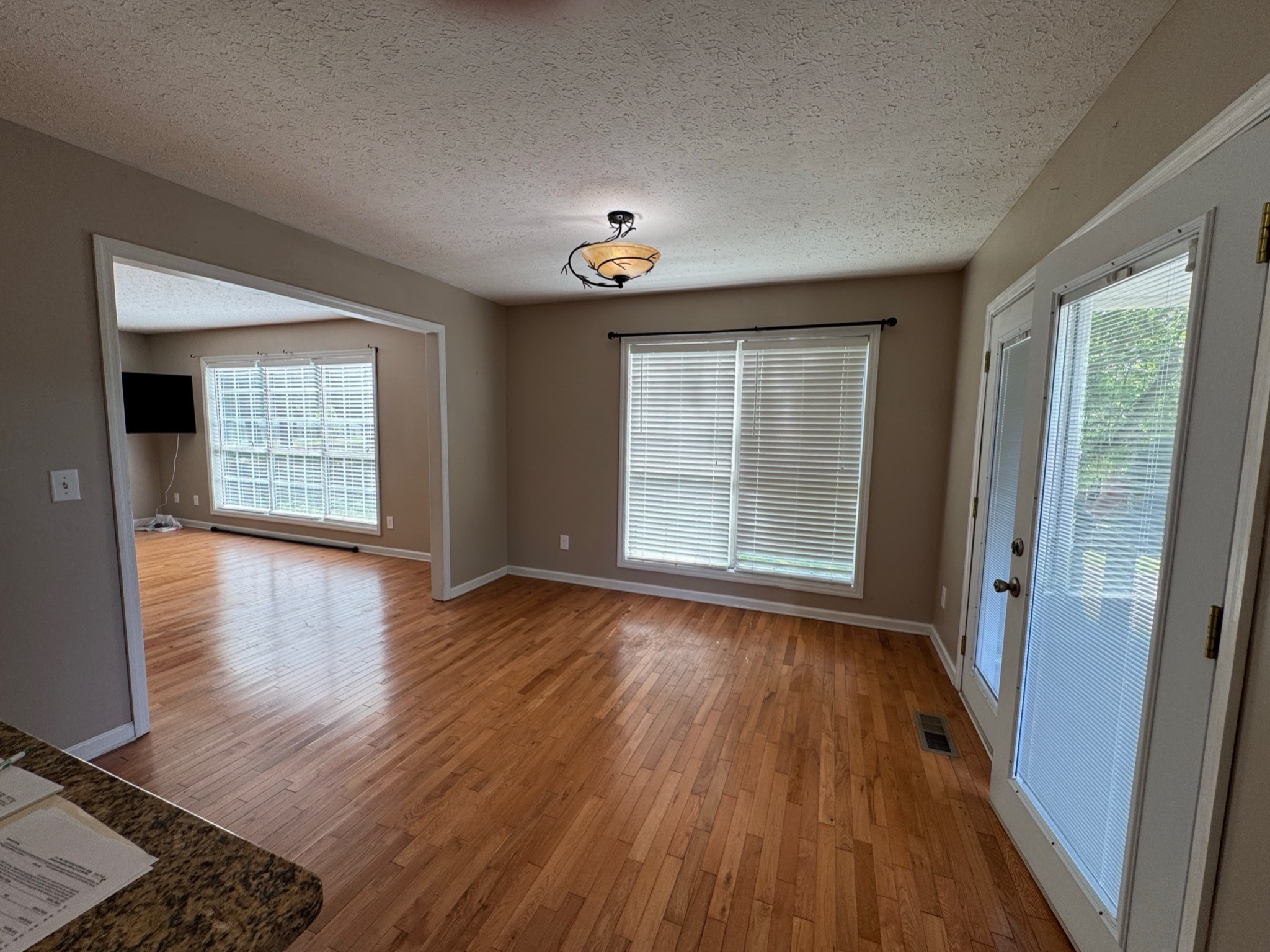 3594 Oak Grove Road Red Boiling Springs, TN 37150 - Photo 22 of 33 wooden floor in an empty room with a window