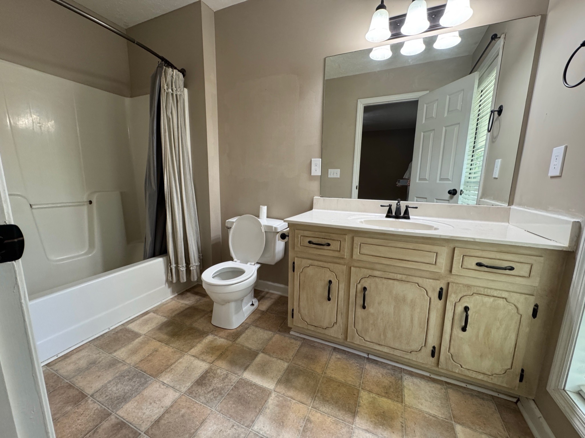 3594 Oak Grove Road Red Boiling Springs, TN 37150 - Photo 30 of 33 a bathroom with a sink toilet and shower