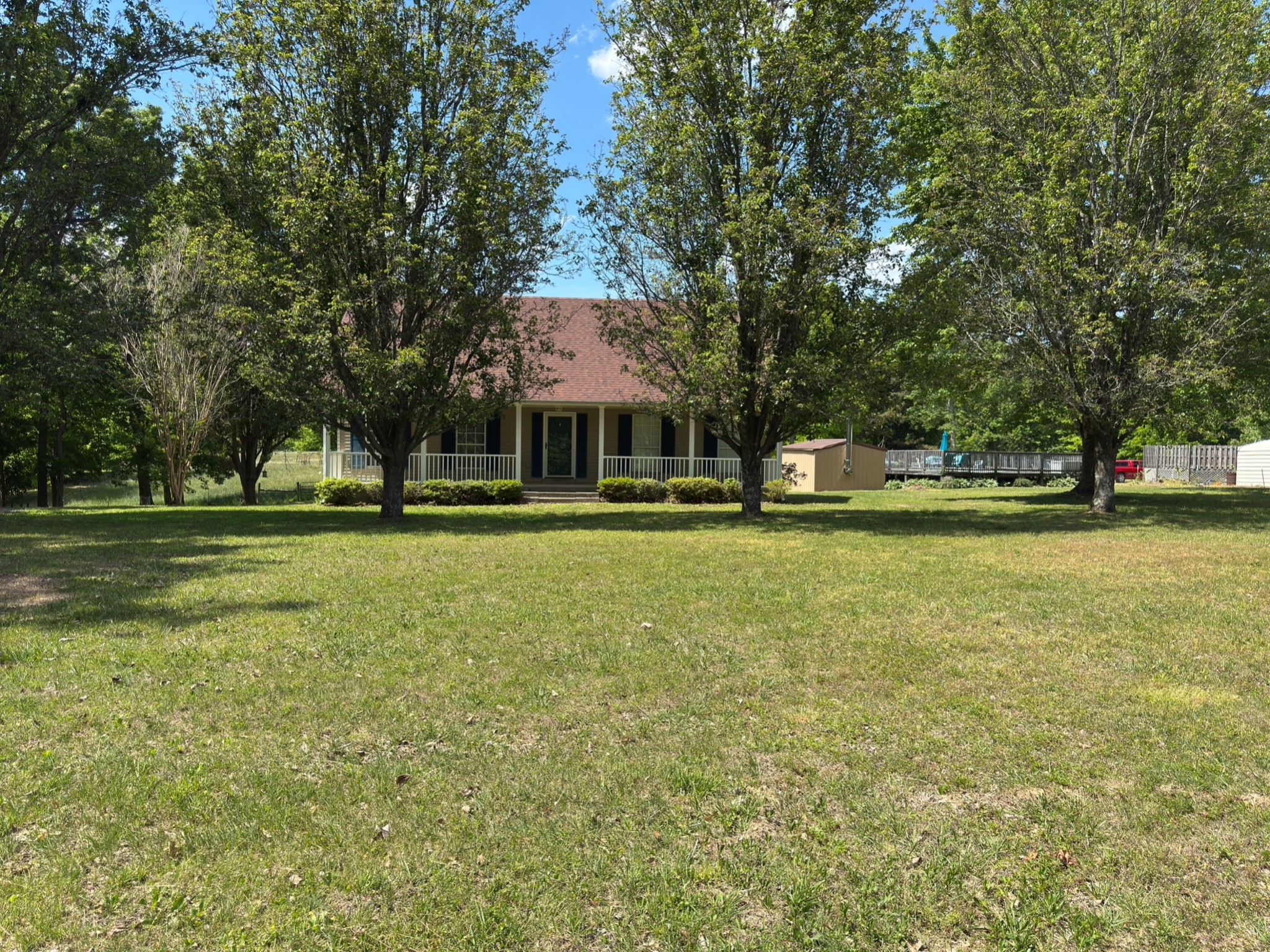 3594 Oak Grove Road Red Boiling Springs, TN 37150 - Photo 3 of 33 a front view of a building with trees and trees