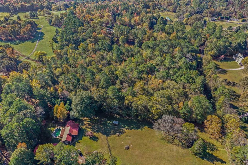 0 Law Road Northwest Cartersville, GA 30120 - Photo 15 of 25 an aerial view of a houses with yard