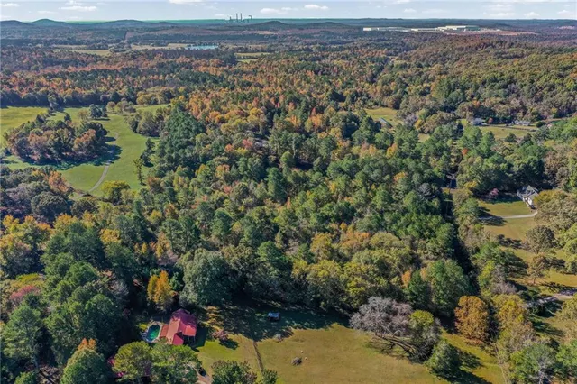 a view of a city and mountains ocean view