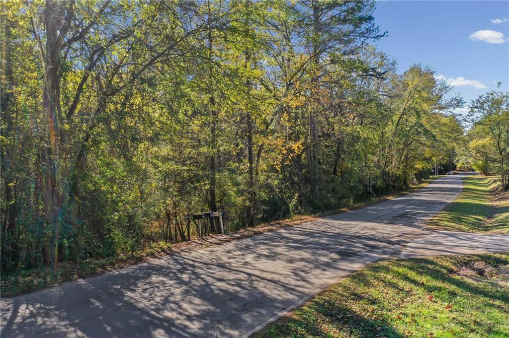 0 Law Road Northwest Cartersville, GA 30120 - Photo 21 of 25 a view of a backyard of a house