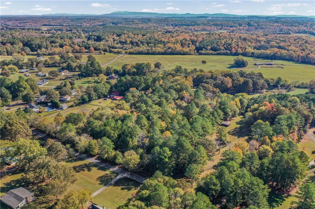 0 Law Road Northwest Cartersville, GA 30120 - Photo 8 of 25 an aerial view of a residential houses with outdoor space and trees