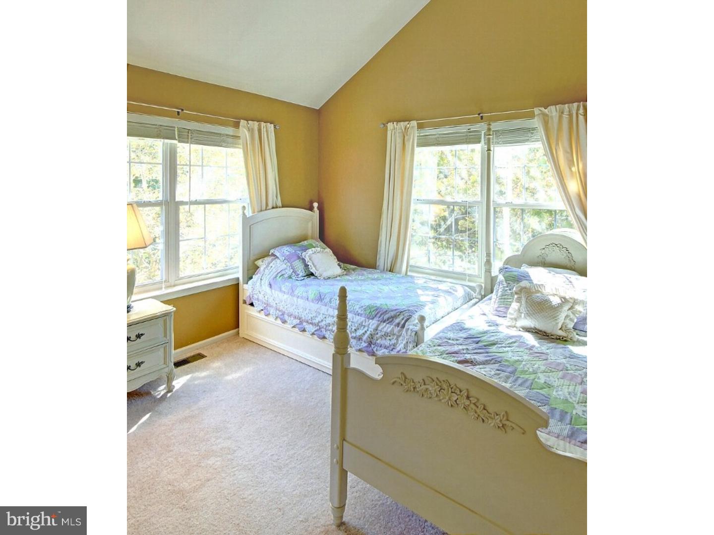 1113 Brian's Way Wayne, PA 19087 - Photo 14 of 25 a bedroom with a bed and large window
