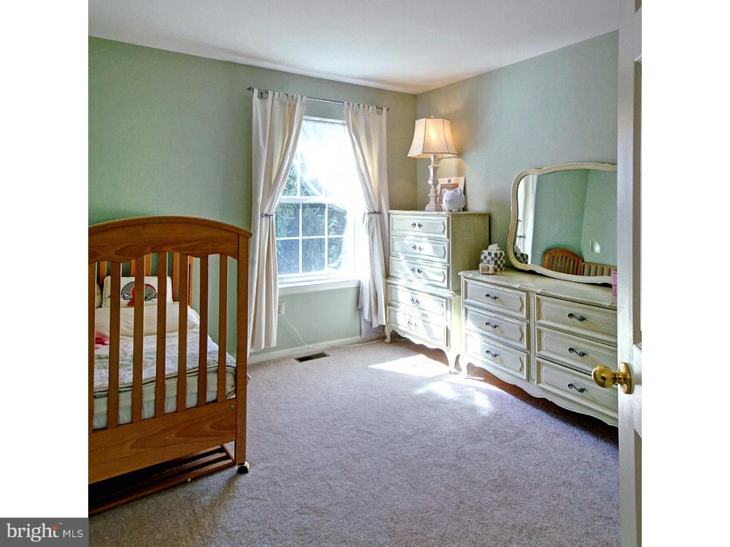 1113 Brian's Way Wayne, PA 19087 - Photo 15 of 25 a view of a bedroom with furniture and windows