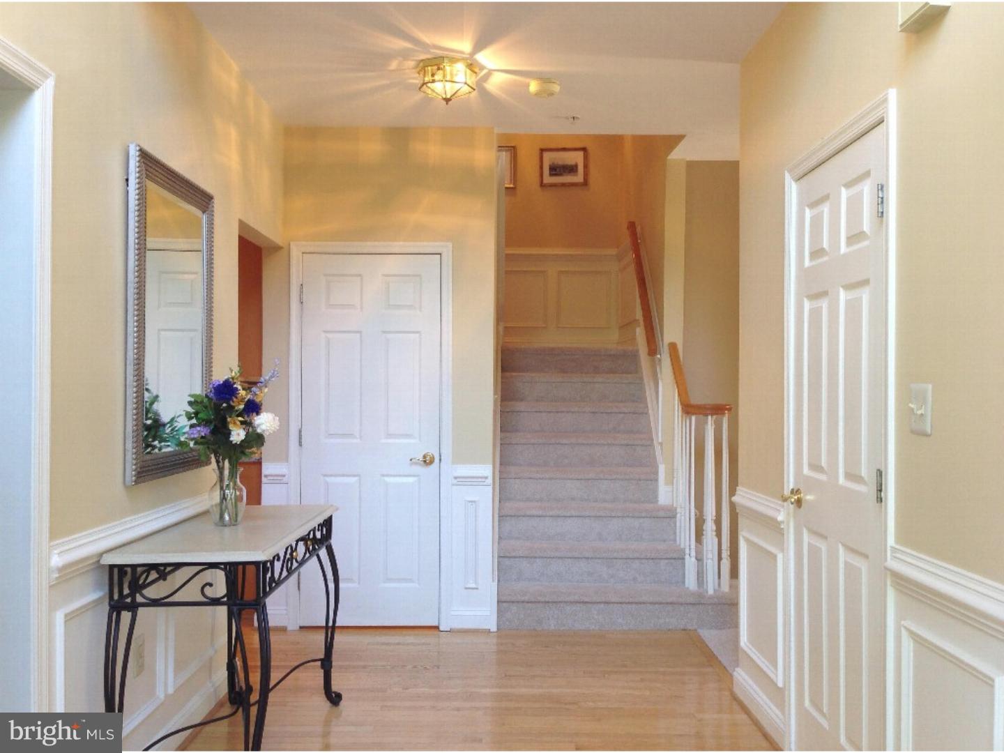 1113 Brian's Way Wayne, PA 19087 - Photo 3 of 25 a view of a hallway and dining room