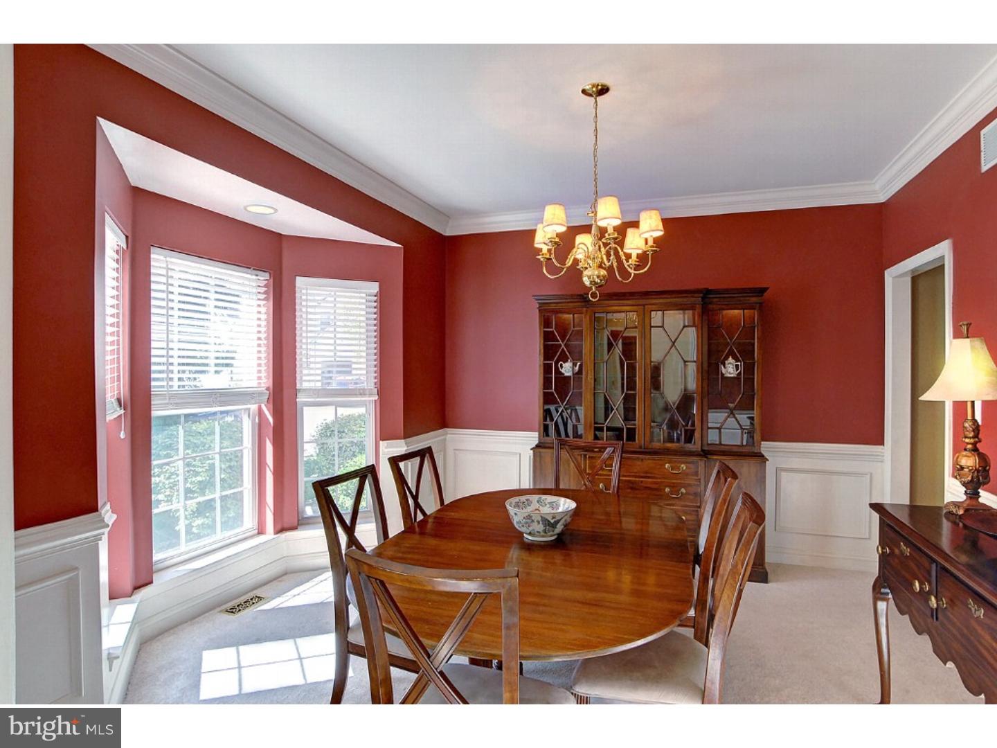 1113 Brian's Way Wayne, PA 19087 - Photo 4 of 25 a dining room with furniture a chandelier and window