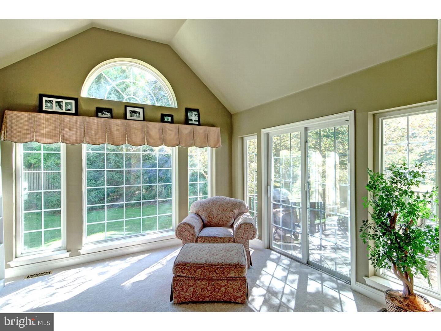 1113 Brian's Way Wayne, PA 19087 - Photo 8 of 25 a living room with a large window and a floor to ceiling window