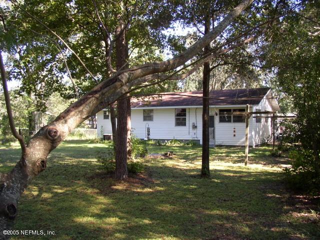 555 Nightingale Street Keystone Heights, FL 32656 - Photo 11 of 11 a front view of house with yard