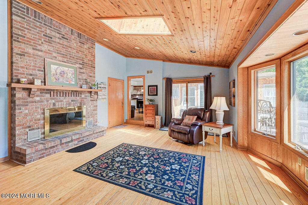 290 Easy Street Howell, NJ 07731 - Photo 14 of 43 a living room with furniture and a fireplace