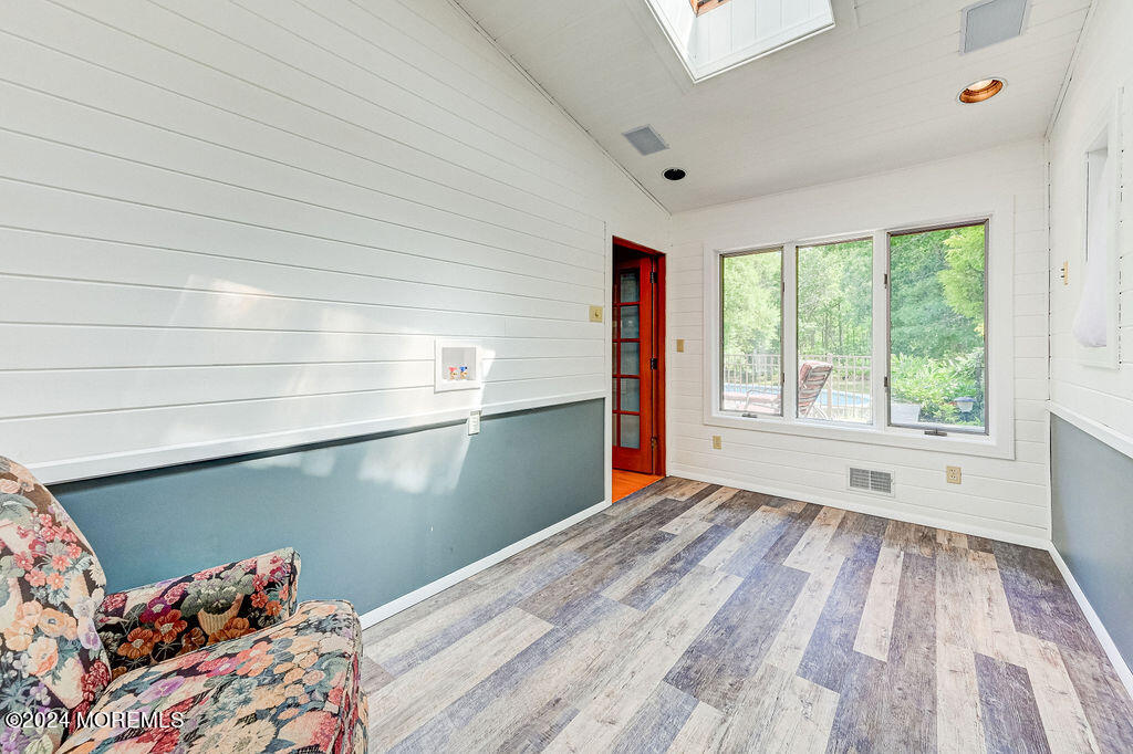 290 Easy Street Howell, NJ 07731 - Photo 16 of 43 a view of empty room with wooden floor and fan