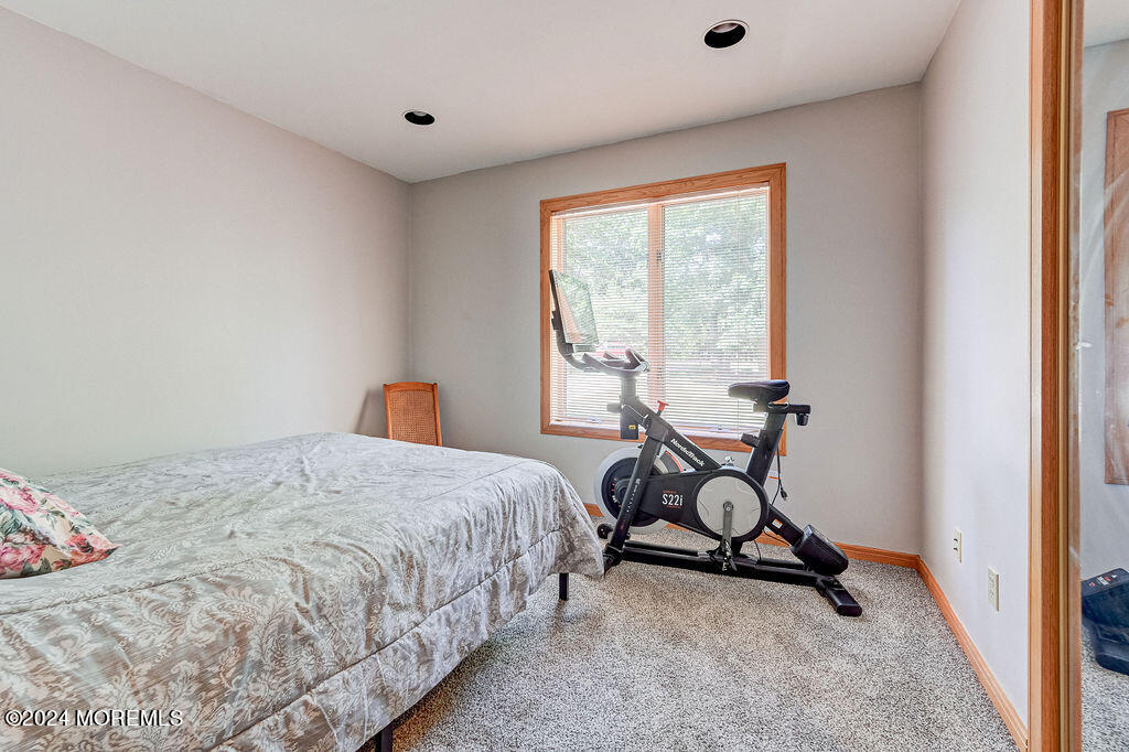 290 Easy Street Howell, NJ 07731 - Photo 19 of 43 a bedroom with furniture and a window