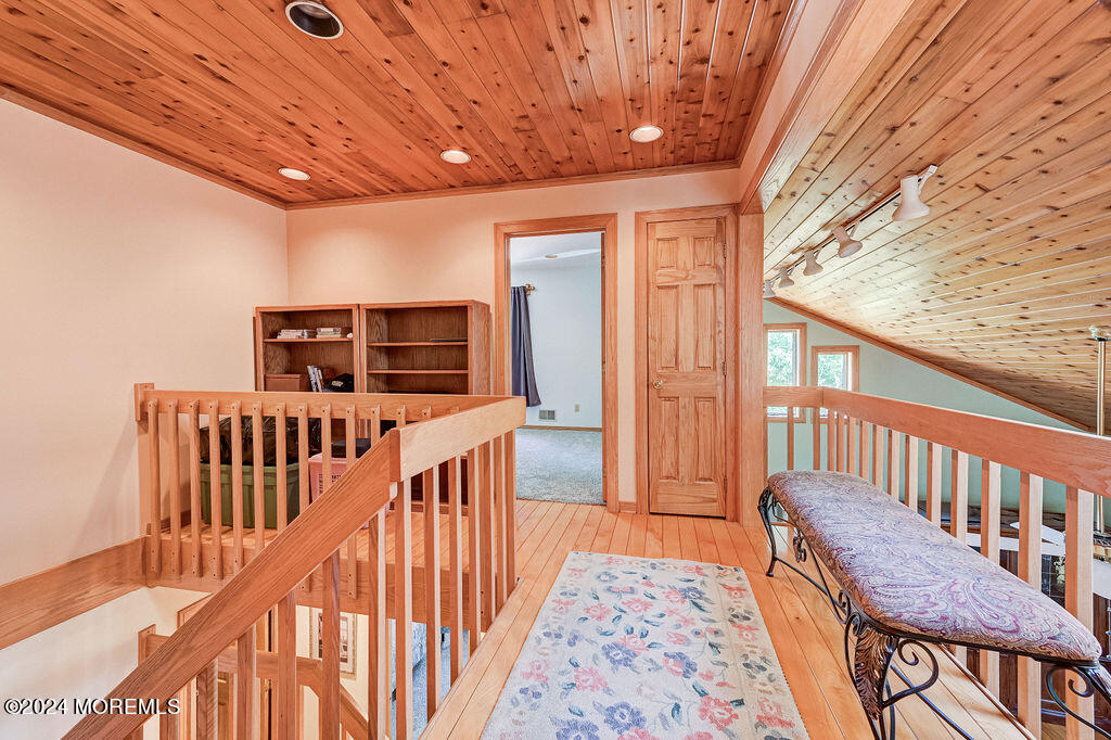 290 Easy Street Howell, NJ 07731 - Photo 24 of 43 a view of hallway with wooden floor