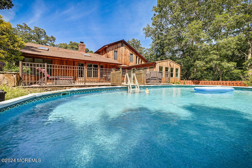 290 Easy Street Howell, NJ 07731 - Photo 35 of 43 a view of a house next to a big yard and large trees