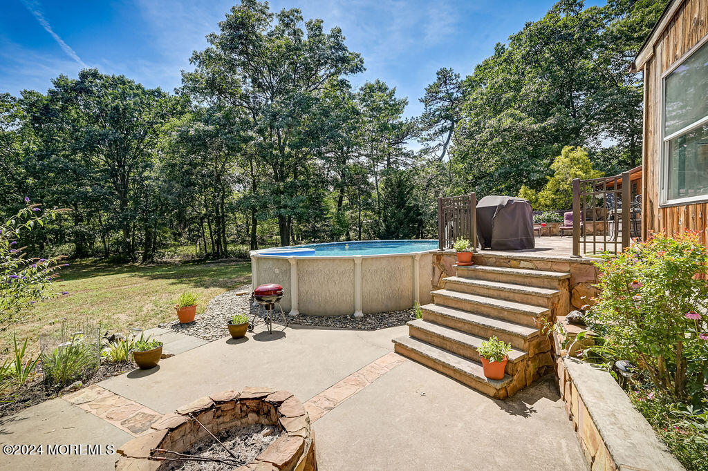 290 Easy Street Howell, NJ 07731 - Photo 38 of 43 a view of a backyard with sitting area