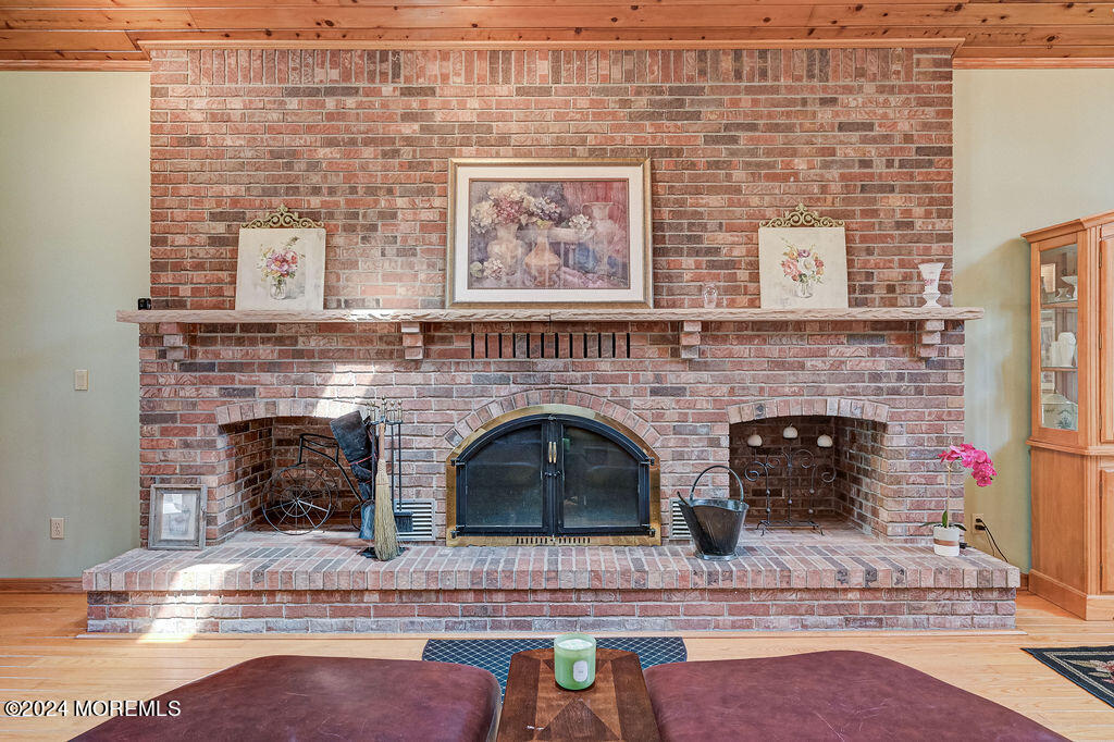 290 Easy Street Howell, NJ 07731 - Photo 8 of 43 a front view of a house with two plants