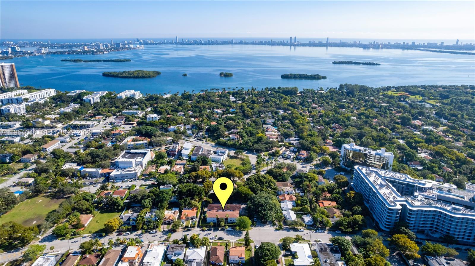 a view of an ocean and city