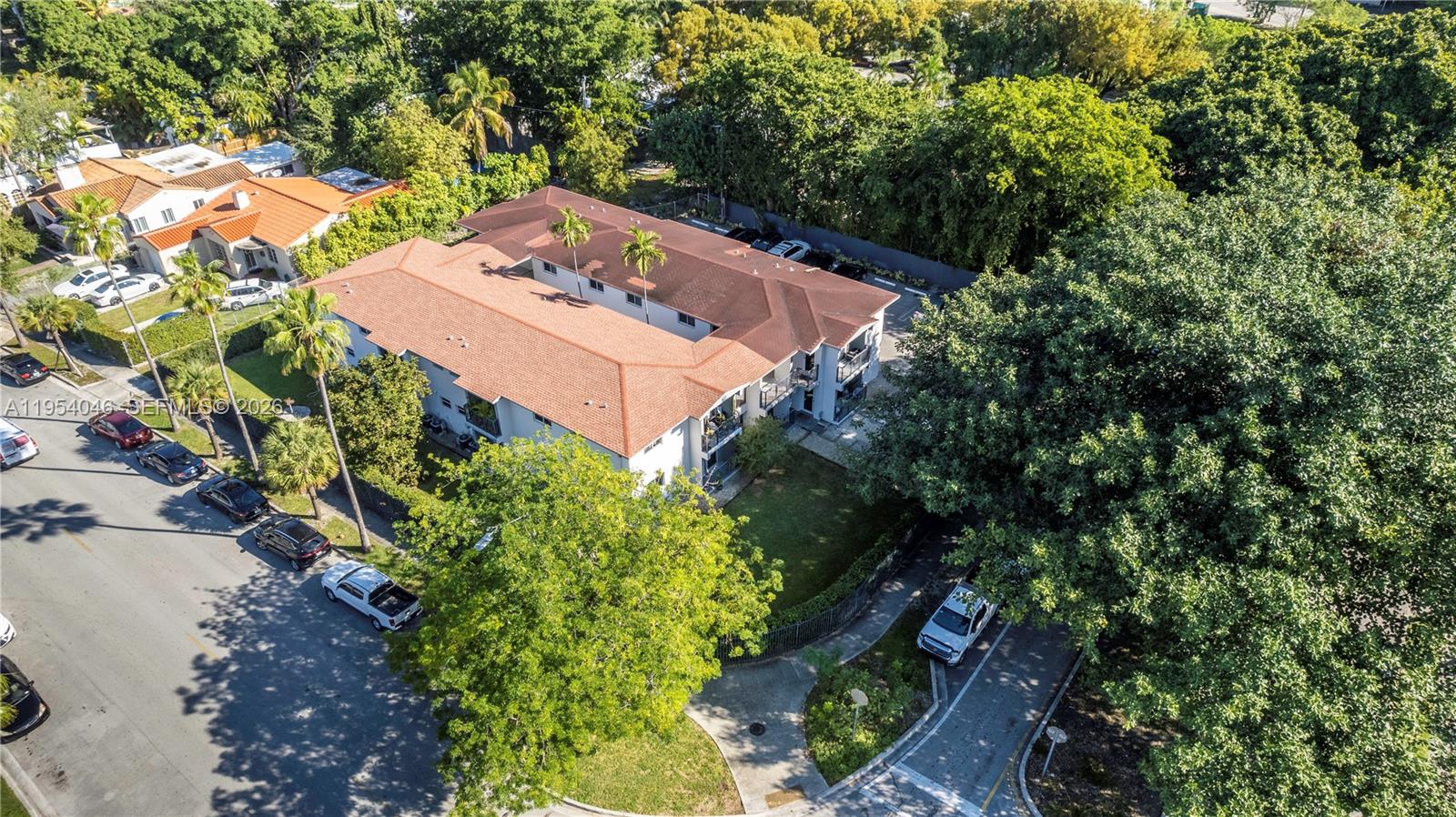 465 Northeast 59th Street, Unit 12 Miami, FL 33137 - Photo 2 of 17 an aerial view of a house with a yard