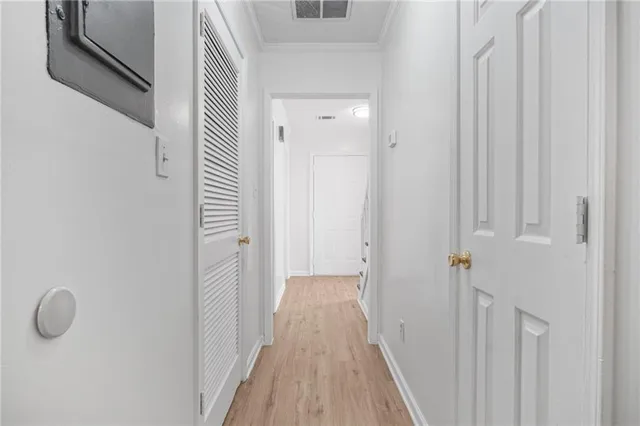 a view of a bathroom from the hallway