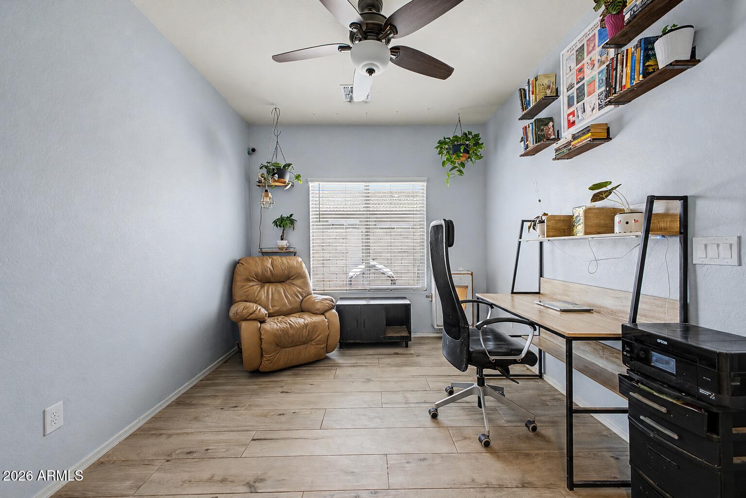 16719 West Rowel Road Surprise, AZ 85387 - Photo 21 of 28 a workspace with furniture and window