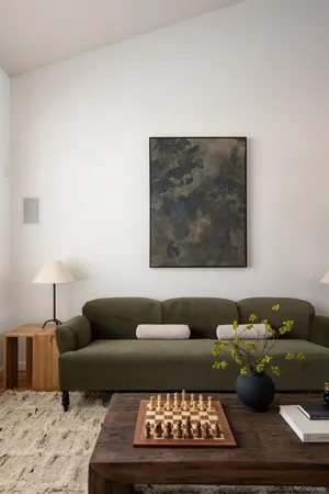 a living room with furniture and a couch