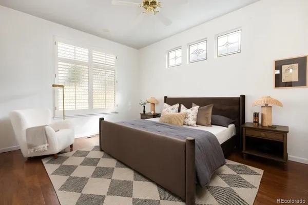a bed room with a bed and a couch