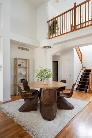 a living room with furniture rug and a window