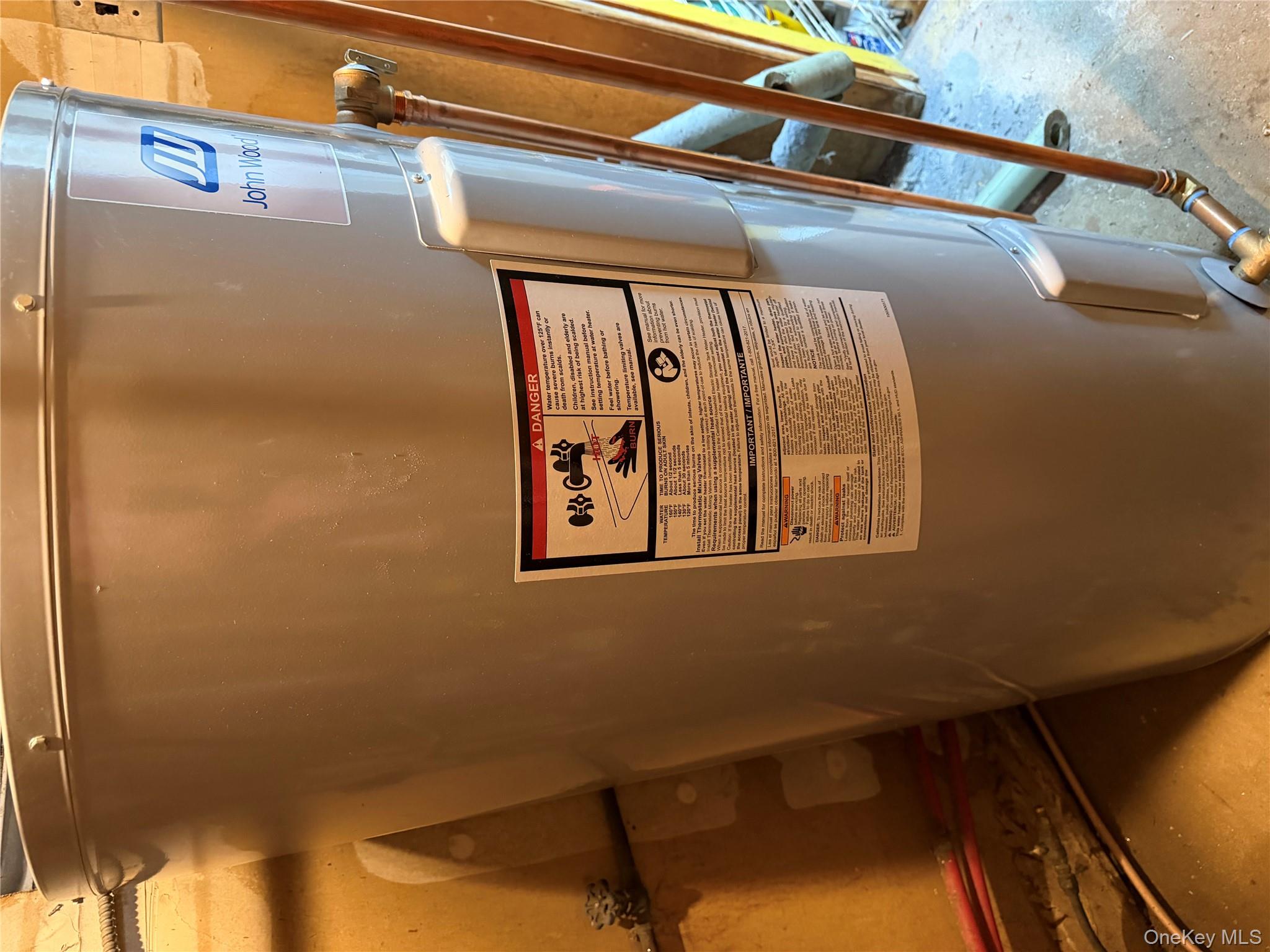 131 Ethel Street Valley Stream, NY 11580 - Photo 16 of 18 a view of water heater room washer and dryer