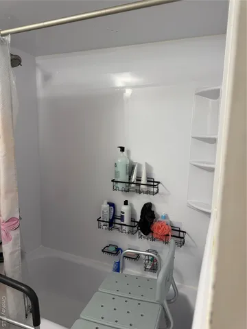 a room with a window and gym equipment