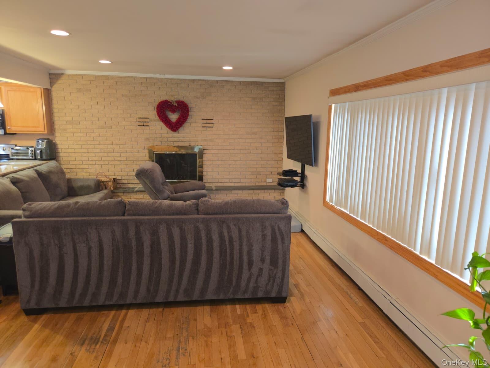 131 Ethel Street Valley Stream, NY 11580 - Photo 9 of 18 a living room with furniture