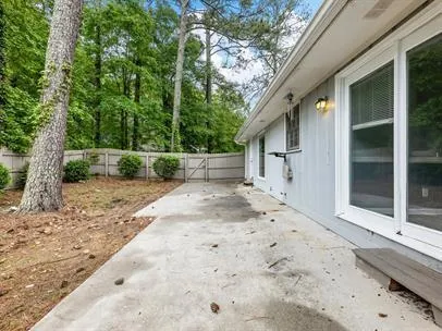 a backyard of a house with lots of green space