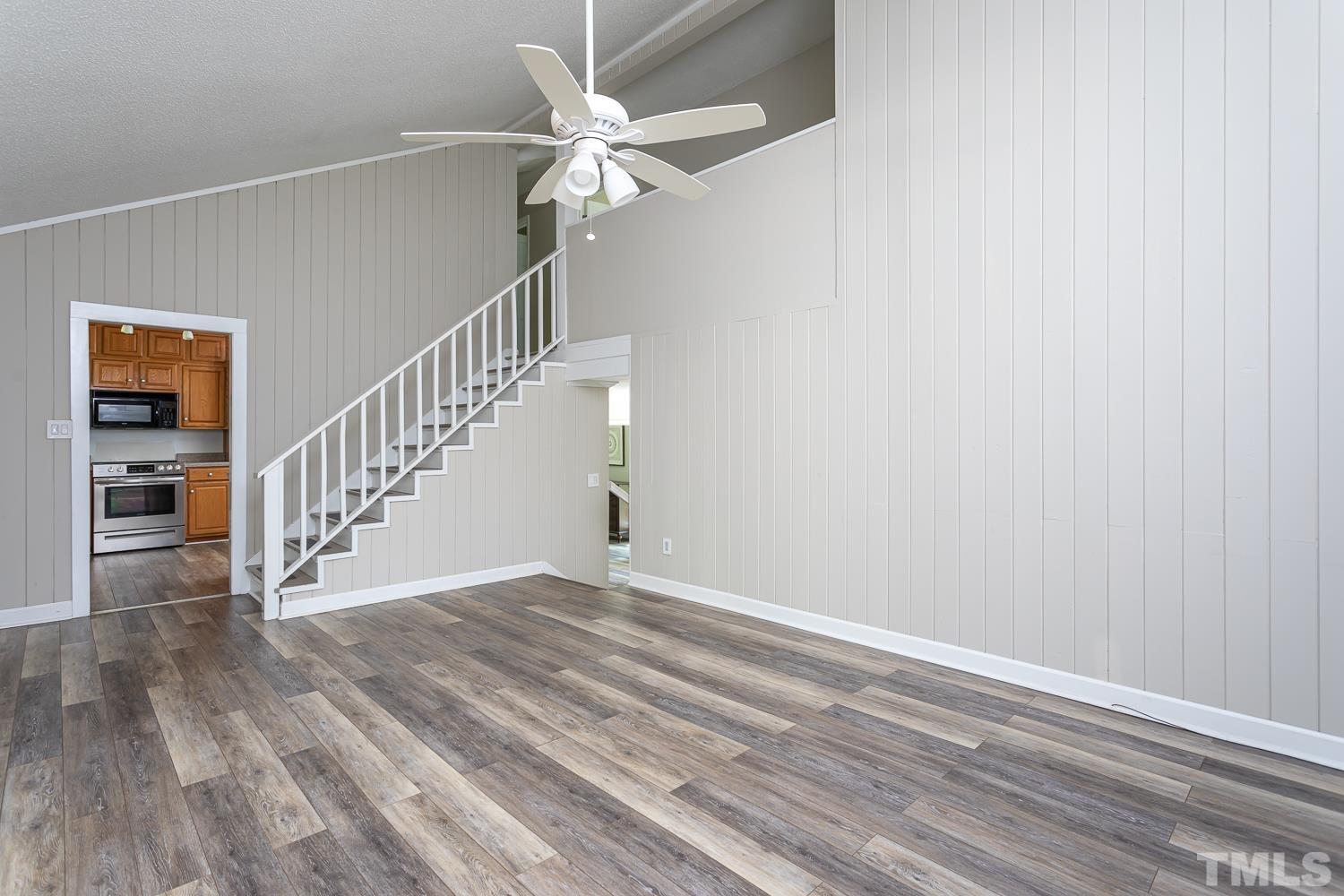 1304 Lake Pine Drive Cary, NC 27511 - Photo 15 of 26 a view of empty room with wooden floor